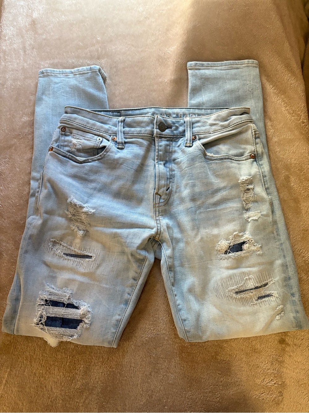 American Eagle Outfitters Light Blue Distressed athletic skinny Jeans